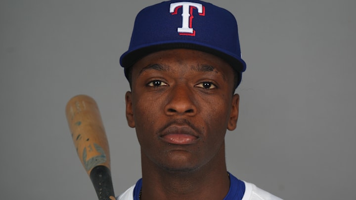Feb 19, 2025; Surprise, AZ, USA; Texas Rangers player Sebastian Walcott poses for a photo during Media Day at Surprise Stadium.
