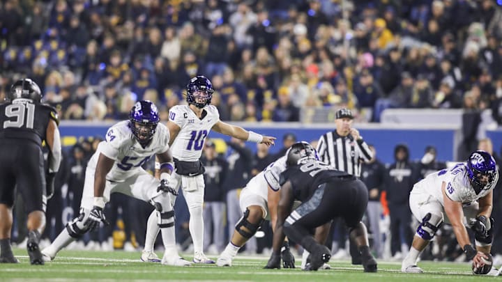 Oct 25, 2025; Morgantown, West Virginia, USA; Texas Christian University Horned Frogs quarterback Josh Hoover (10) changes the play at the line of scrimmage during the third quarter against the West Virginia Mountaineers at Milan Puskar Stadium. Mandatory Credit: Ben Queen-Imagn Images