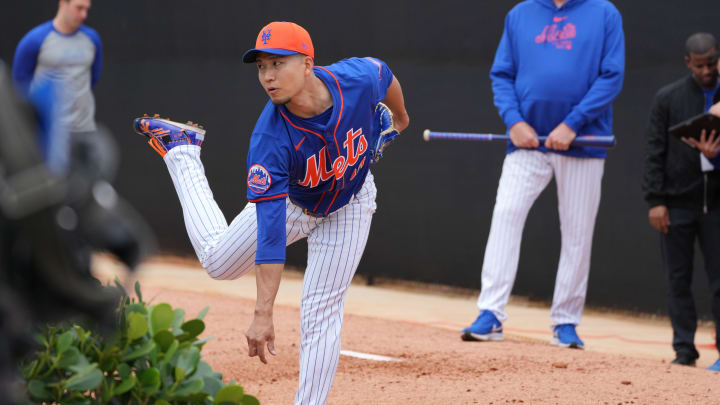 Feb 19, 2024; Port St. Lucie, FL, USA; New York Mets starting pitcher Kodai Senga (34) warms-up