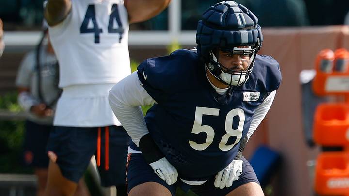 Chicago Bears offensive tackle Darnell Wright (58) stretches during training camp at Halas Hall. Mandatory Credit: Kamil Krzaczynski-Imagn Images Chicago Bears offensive tackle Darnell Wright (58) stretches during training camp at Halas Hall. Mandatory Credit: Kamil Krzaczynski-Imagn Images