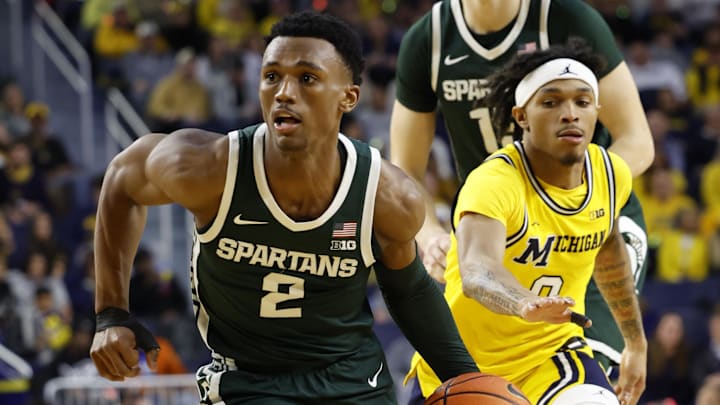 Feb 17, 2024; Ann Arbor, Michigan, USA;  Michigan State Spartans guard Tyson Walker (2) dribbles in