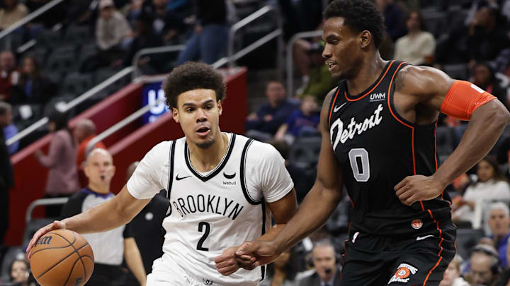 Dec 26, 2023; Detroit, Michigan, USA; Brooklyn Nets forward Cameron Johnson (2) dribbles while Dec 26, 2023; Detroit, Michigan, USA; Brooklyn Nets forward Cameron Johnson (2) dribbles while