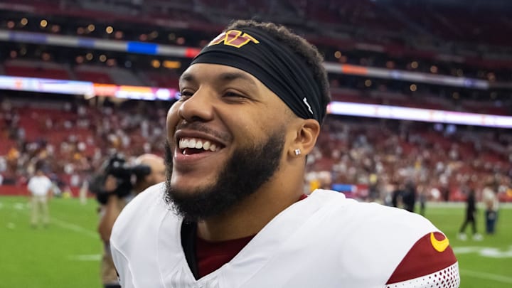 Sep 29, 2024; Glendale, Arizona, USA; Washington Commanders running back Chris Rodriguez Jr. (23) against the Arizona Cardinals at State Farm Stadium. 
