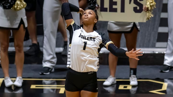 Purdue Redshirt Sophomore Rachel Williams (1) serves 