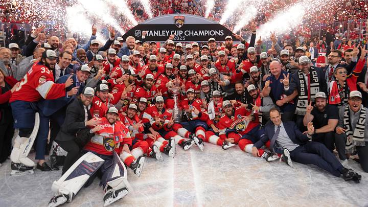Jun 17, 2025; Sunrise, Florida, USA; The Florida Panthers pose for a photo with the Stanley Cup after winning game six of the 2025 Stanley Cup Final against the Edmonton Oilers at Amerant Bank Arena. Mandatory Credit: Sam Navarro-Imagn Images