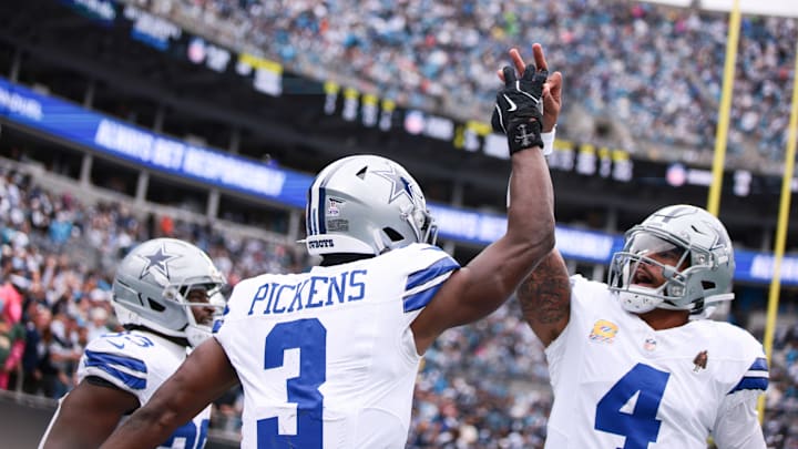 Dallas Cowboys wide receiver George Pickens celebrates a touchdown with Dak Prescott against the Carolina Panthers Dallas Cowboys wide receiver George Pickens celebrates a touchdown with Dak Prescott against the Carolina Panthers