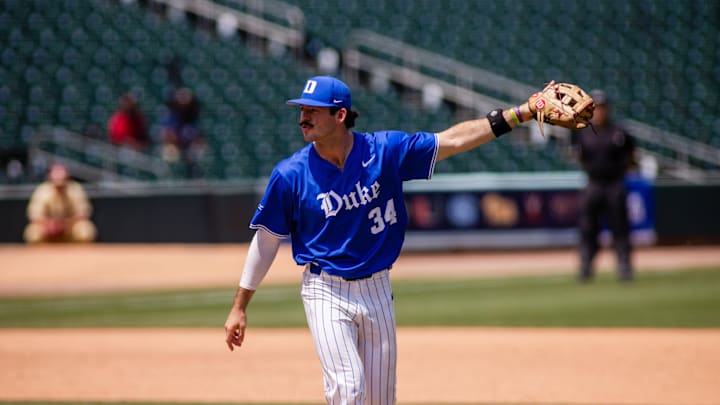 May 26, 2024; Charlotte, NC, USA; Duke Blue Devils infielder Ben Miller (34) celebrates the final out of the eighth inning against the Florida State Seminoles during the ACC Baseball Tournament at Truist Field. Mandatory Credit: Scott Kinser-Imagn Images