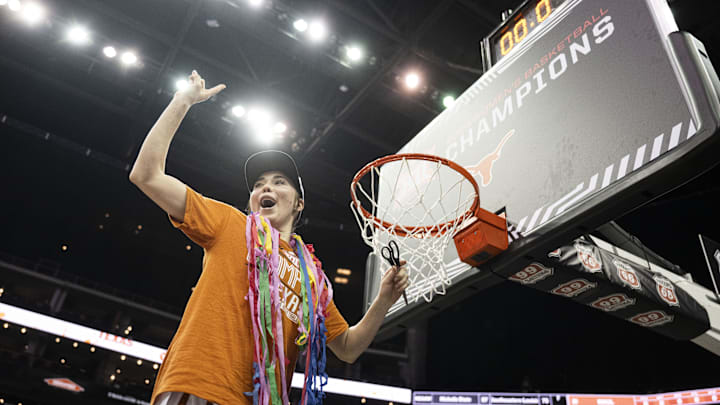 Mar 12, 2024; Kansas City, MO, USA; Texas Longhorns guard Shaylee Gonzales (2) cuts down a piece of