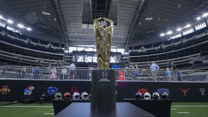 Jul 13, 2022; Arlington, TX, USA; A view of the College Football Championship trophy during the Big 12 Media Day at AT&T Stadium. Mandatory Credit: Jerome Miron-USA TODAY Sports Jul 13, 2022; Arlington, TX, USA; A view of the College Football Championship trophy during the Big 12 Media Day at AT&T Stadium. Mandatory Credit: Jerome Miron-USA TODAY Sports