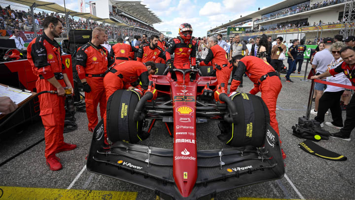 Oct 23, 2022; Austin, Texas, USA; Scuderia Ferrari driver Carlos Sainz (55) of Team Spain exits his car before the start of the U.S. Grand Prix F1 race at Circuit of the Americas. Mandatory Credit: Jerome Miron-USA TODAY Sports
