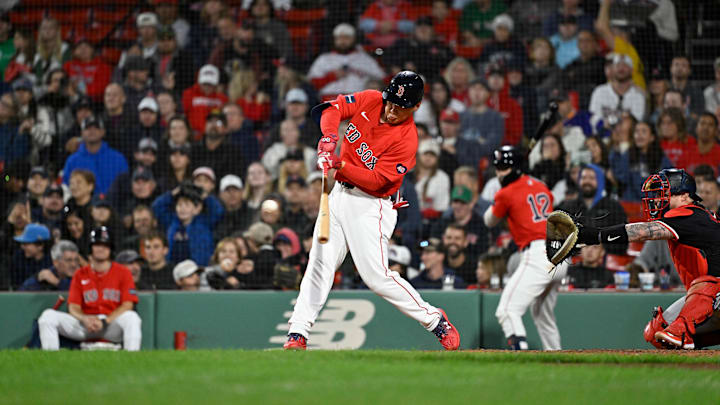 Sep 22, 2024; Boston, MA, USA; Boston Red Sox designated hitter Masataka Yoshida (7) hits an RBI single against the Minnesota Twins during the sixth inning at Fenway Park. Mandatory Credit: Eric Canha-Imagn Images Sep 22, 2024; Boston, MA, USA; Boston Red Sox designated hitter Masataka Yoshida (7) hits an RBI single against the Minnesota Twins during the sixth inning at Fenway Park. Mandatory Credit: Eric Canha-Imagn Images
