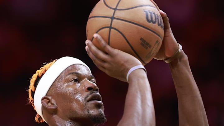 Dec 12, 2024; Miami, Florida, USA;  Miami Heat forward Jimmy Butler (22) shoots a technical foul against the Toronto Raptors during the second half at Kaseya Center. Mandatory Credit: Rhona Wise-Imagn Images
