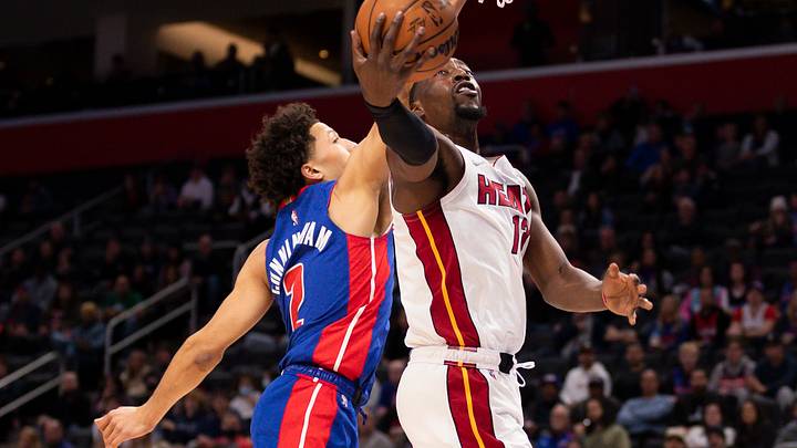 Nov 23, 2021; Detroit, Michigan, USA; Miami Heat center Bam Adebayo (13) goes up for a shot against Detroit Pistons guard Cade Cunningham (2) during the first quarter at Little Caesars Arena. Mandatory Credit: Raj Mehta-USA TODAY Sports Nov 23, 2021; Detroit, Michigan, USA; Miami Heat center Bam Adebayo (13) goes up for a shot against Detroit Pistons guard Cade Cunningham (2) during the first quarter at Little Caesars Arena. Mandatory Credit: Raj Mehta-USA TODAY Sports