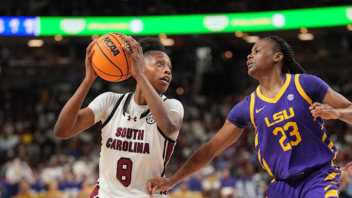Mar 7, 2026; Greenville, SC, USA; South Carolina Gamecocks forward Joyce Edwards (8) tries to elude Louisiana State Tigers guard Milaysia Fulwiley (23) during the second half at Bon Secours Wellness Arena. Mandatory Credit: Jim Dedmon-Imagn Images
