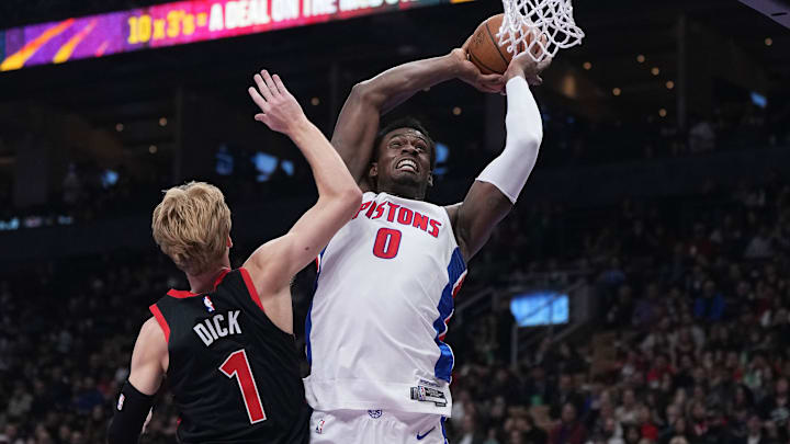 Nov 15, 2024; Toronto, Ontario, CAN; Detroit Pistons center Jalen Duren (0) drives to the basket over Toronto Raptors guard Gradey Dick (1) during the first quarter at Scotiabank Arena. Mandatory Credit: Nick Turchiaro-Imagn Images Nov 15, 2024; Toronto, Ontario, CAN; Detroit Pistons center Jalen Duren (0) drives to the basket over Toronto Raptors guard Gradey Dick (1) during the first quarter at Scotiabank Arena. Mandatory Credit: Nick Turchiaro-Imagn Images