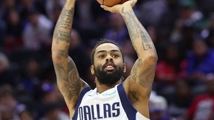 Dec 20, 2025; Philadelphia, Pennsylvania, USA; Dallas Mavericks guard D'Angelo Russell (5) shoots against the Philadelphia 76ers during the second quarter at Xfinity Mobile Arena. Mandatory Credit: Bill Streicher-Imagn Images