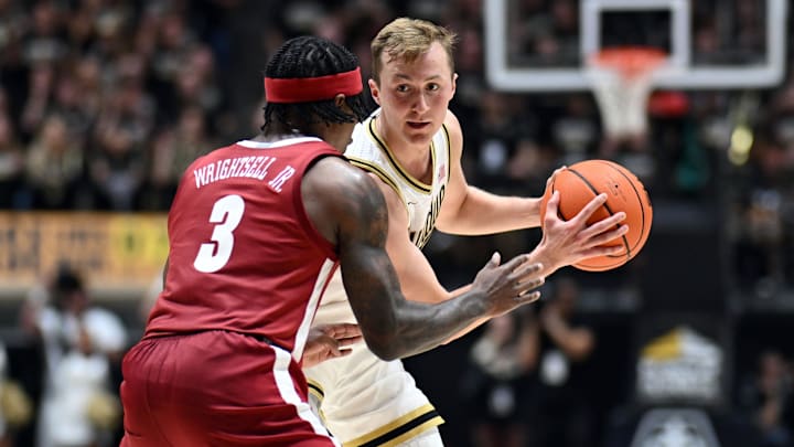 Purdue guard Fletcher Loyer (2) looks to get the ball past Alabama guard Latrell Wrightsell Jr. (3)