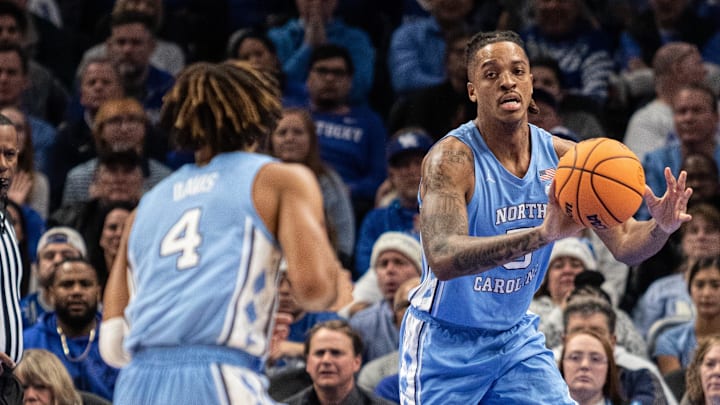 Dec 16, 2023; Atlanta, Georgia, USA; North Carolina Tar Heels forward Armando Bacot (5) passes the