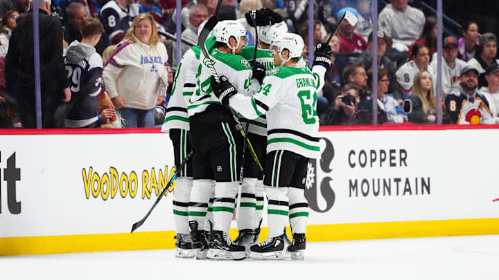 May 1, 2025; Denver, Colorado, USA; Members of the celebrate the goal ahead goal by Dallas Stars right wing Mikko Rantanen (96) (center) in the second period against the Colorado Avalanche in game six of the first round of the 2025 Stanley Cup Playoffs at Ball Arena. Mandatory Credit: Ron Chenoy-Imagn Images