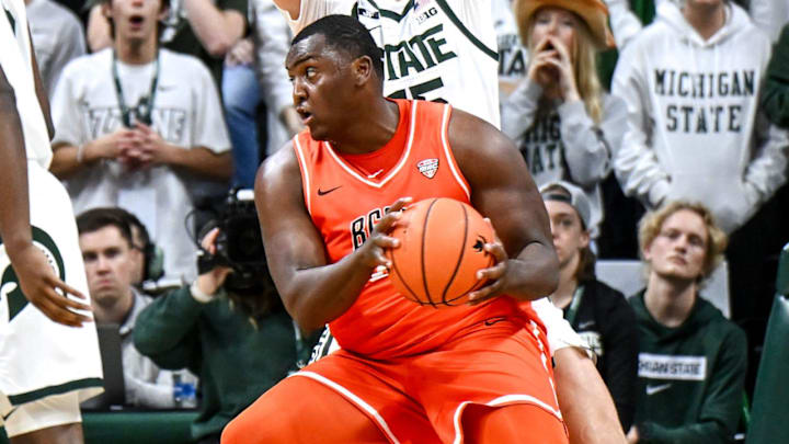 Michigan State's Carson Cooper, top, defends against Bowling Green's Marcus Johnson during the second half on Saturday, Nov. 16, 2024, Breslin Center in East Lansing. Michigan State's Carson Cooper, top, defends against Bowling Green's Marcus Johnson during the second half on Saturday, Nov. 16, 2024, Breslin Center in East Lansing.
