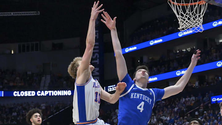 Mar 13, 2026; Nashville, TN, USA; Florida Gators forward Thomas Haugh (10) shoots over Kentucky Wildcats forward Andrija Jelavic (4) during the first half at Bridgestone Arena. Mandatory Credit: Steve Roberts-Imagn Images Mar 13, 2026; Nashville, TN, USA; Florida Gators forward Thomas Haugh (10) shoots over Kentucky Wildcats forward Andrija Jelavic (4) during the first half at Bridgestone Arena. Mandatory Credit: Steve Roberts-Imagn Images