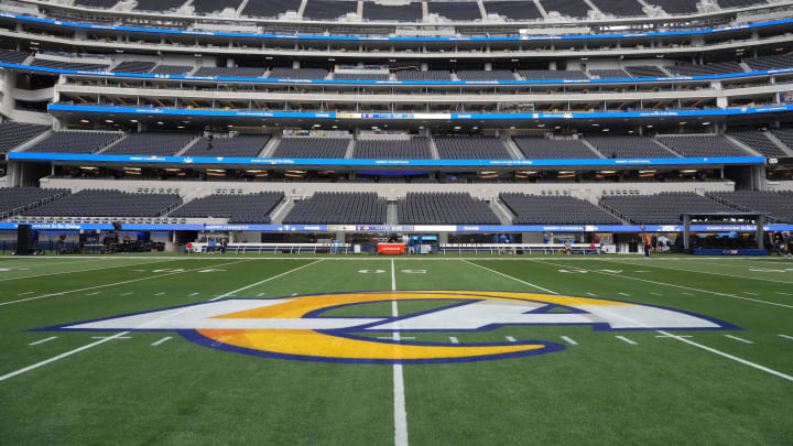 Dec 21, 2023; Inglewood, California, USA; The Los Angeles Rams logo at midifeld at SoFi Stadium. Mandatory Credit: Kirby Lee-USA TODAY Sports Dec 21, 2023; Inglewood, California, USA; The Los Angeles Rams logo at midifeld at SoFi Stadium. Mandatory Credit: Kirby Lee-USA TODAY Sports