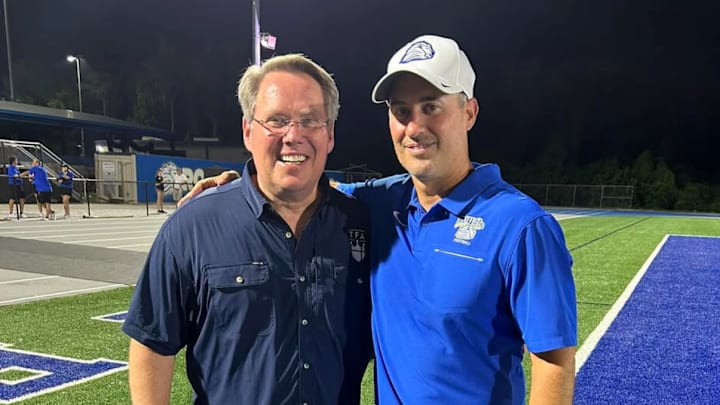 The First Academy (Orlando) football coach Jeff Conaway, right, has been banned from coaching for the 2025 season following a number or rules violations reported by the FHSAA last November. Dr. Steve Whitaker, left, is Head of School at TFA.