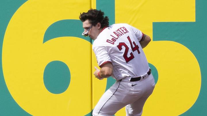 Jun 13, 2026; Cleveland, Ohio, USA; Cleveland Guardians right fielder Chase DeLauter (24) loses control of the ball as he crashes into the wall at the warning track during the first inning against the Detroit Tigers at Progressive Field. Mandatory Credit: Scott Galvin-Imagn Images Jun 13, 2026; Cleveland, Ohio, USA; Cleveland Guardians right fielder Chase DeLauter (24) loses control of the ball as he crashes into the wall at the warning track during the first inning against the Detroit Tigers at Progressive Field. Mandatory Credit: Scott Galvin-Imagn Images