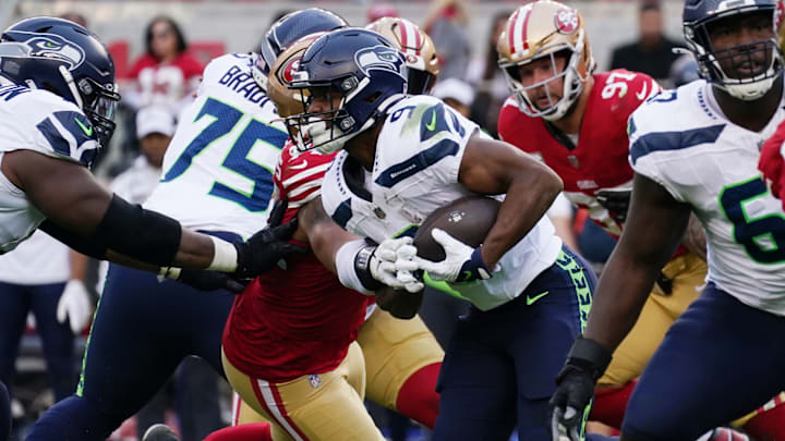 Nov 17, 2024; Santa Clara, California, USA; Seattle Seahawks running back Kenneth Walker III (9) rushes the ball against the Seattle Seahawks in the second quarter at Levi's Stadium. Nov 17, 2024; Santa Clara, California, USA; Seattle Seahawks running back Kenneth Walker III (9) rushes the ball against the Seattle Seahawks in the second quarter at Levi's Stadium.