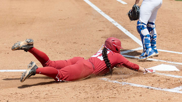 Alabama utility player Alexis Pupillo slides home in the third game of the series against Kentucky on Apr. 19, 2026.