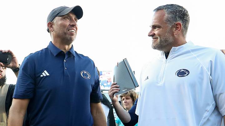 Penn State Nittany Lions athletic director Pat Kraft (right) speaks with head coach Matt Campbell (left) following the game against the Marshall Thundering Herd at Beaver Stadium. Penn State Nittany Lions athletic director Pat Kraft (right) speaks with head coach Matt Campbell (left) following the game against the Marshall Thundering Herd at Beaver Stadium.