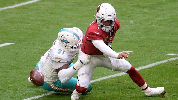 Miami Dolphins defensive end Emmanuel Ogbah (91) sacks and causes a fumble by Arizona Cardinals quarterback Kyler Murray (1) during the first half at State Farm Stadium. Miami Dolphins defensive end Emmanuel Ogbah (91) sacks and causes a fumble by Arizona Cardinals quarterback Kyler Murray (1) during the first half at State Farm Stadium.
