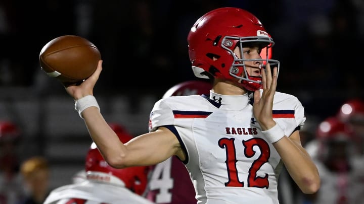 Brentwood Academy George MacIntyre (12) passes against MBA during an high school football game Thursday, Oct. 26, 2023, in Nashville, Tenn.