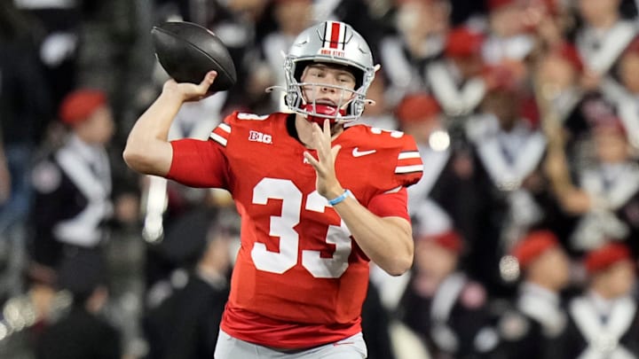 Sep 7, 2024; Columbus, Ohio, USA; Ohio State Buckeyes quarterback Devin Brown (33) throws a pass during the second half of the NCAA football game against the Western Michigan Broncos at Ohio Stadium.