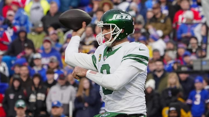 Dec 29, 2024; Orchard Park, New York, USA; New York Jets quarterback Aaron Rodgers (8) throws the ball against the Buffalo Bills during the second half at Highmark Stadium.