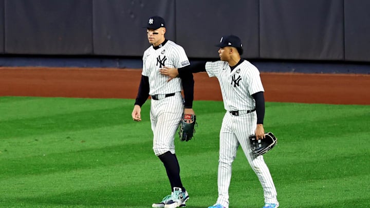 Oct 30, 2024; Bronx, New York, USA; New York Yankees outfielder Juan Soto (22) reacts with outfielder Aaron Judge (99) after Judge dropped a fly ball during the fifth inning against the Los Angeles Dodgers during game five of the 2024 MLB World Series at Yankee Stadium. Mandatory Credit: James Lang-Imagn Images Oct 30, 2024; Bronx, New York, USA; New York Yankees outfielder Juan Soto (22) reacts with outfielder Aaron Judge (99) after Judge dropped a fly ball during the fifth inning against the Los Angeles Dodgers during game five of the 2024 MLB World Series at Yankee Stadium. Mandatory Credit: James Lang-Imagn Images