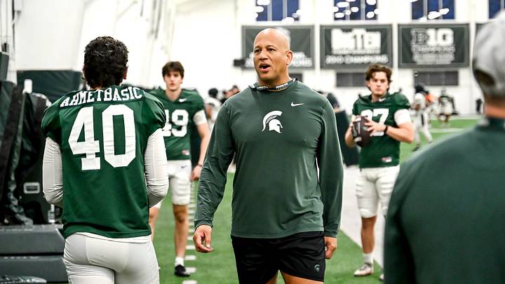 Michigan State's assistant head coach/special teams coordinator LeVar Woods talks with Tarik Ahmetbasic, left, and other on special teams during spring football practice on Tuesday, April 14, 2026, in East Lansing. Michigan State's assistant head coach/special teams coordinator LeVar Woods talks with Tarik Ahmetbasic, left, and other on special teams during spring football practice on Tuesday, April 14, 2026, in East Lansing.