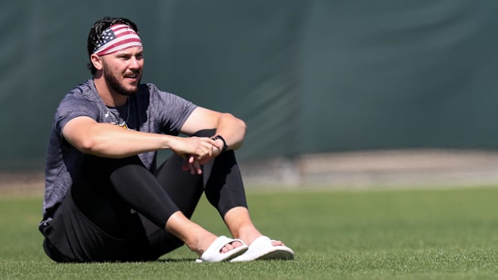 Feb 17, 2025; Bradenton, FL, USA;  Pittsburgh Pirates pitcher Paul Skenes (30) looks on from the outfield during spring training workouts at Pirate City. Mandatory Credit: Nathan Ray Seebeck-Imagn Images