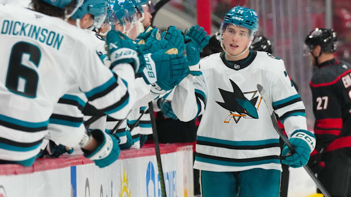 Dec 7, 2025; Raleigh, North Carolina, USA; San Jose Sharks center Macklin Celebrini (71) is congratulated after his empty net goal against the Carolina Hurricanes during the third period at Lenovo Center. Mandatory Credit: James Guillory-Imagn Images Dec 7, 2025; Raleigh, North Carolina, USA; San Jose Sharks center Macklin Celebrini (71) is congratulated after his empty net goal against the Carolina Hurricanes during the third period at Lenovo Center. Mandatory Credit: James Guillory-Imagn Images