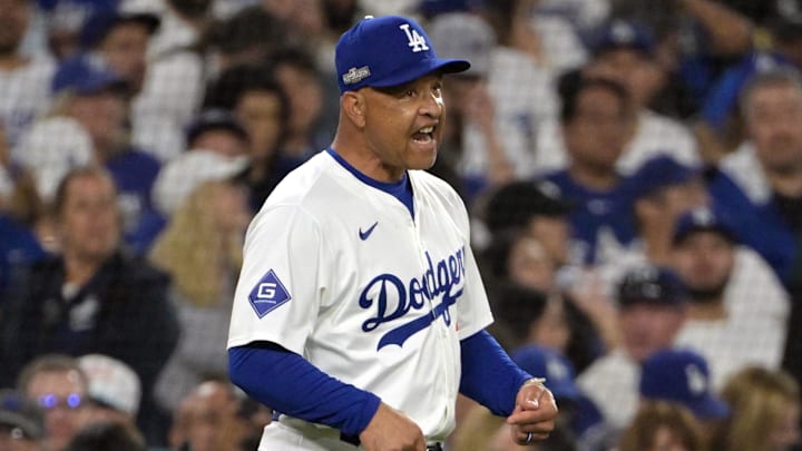 Oct 11, 2024; Los Angeles, California, USA; Los Angeles Dodgers manager Dave Roberts (30) reacts in the eighth inning against the San Diego Padres during game five of the NLDS for the 2024 MLB Playoffs at Dodger Stadium. Mandatory Credit: Jayne Kamin-Oncea-Imagn Images