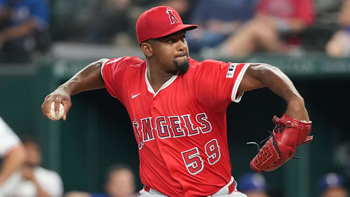Aug 25, 2025; Arlington, Texas, USA; Los Angeles Angels starting pitcher Jose Soriano (59) delivers a pitch to the Texas Rangers during the third inning at Globe Life Field. Mandatory Credit: Jim Cowsert-Imagn Images
