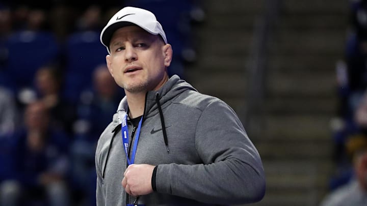 Penn State wrestling coach Cael Sanderson looks on during the 2024 U.S. Olympic Wrestling Team Trials at Bryce Jordan Center in State College.  