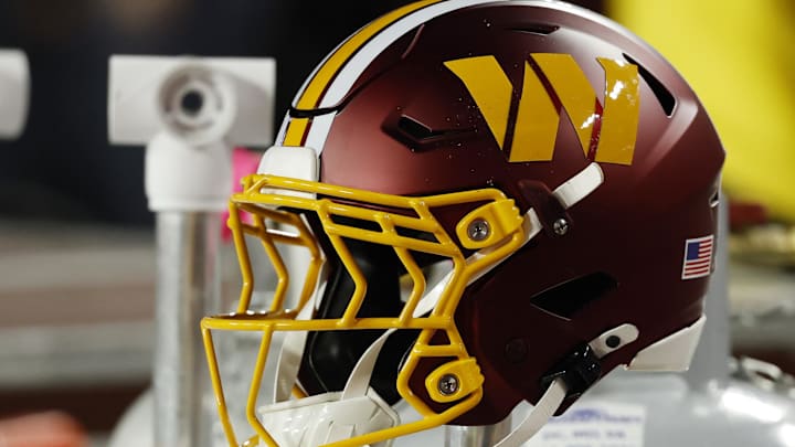 Nov 2, 2025; Landover, Maryland, USA; A Washington Commanders player's helmet on the bench during the game against the Seattle Seahawks at Northwest Stadium. Mandatory Credit: Geoff Burke-Imagn Images