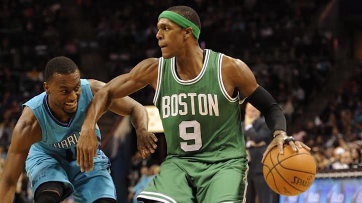 Dec 10, 2014; Charlotte, NC, USA; Boston Celtics guard Rajon Rondo (9) drives against Charlotte Hornets guard Kemba Walker (15) during the second half of the game at Time Warner Cable Arena. Hornets win 96-87. Mandatory Credit: Sam Sharpe-Imagn Images