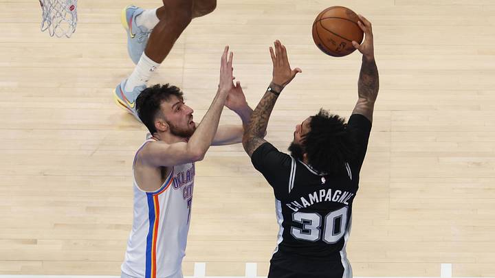 May 26, 2026; Oklahoma City, Oklahoma, USA; San Antonio Spurs forward Julian Champagnie (30) shoots against Oklahoma City Thunder center Chet Holmgren (7) during the second quarter in game five of the western conference finals for the 2026 NBA playoffs at Paycom Center. May 26, 2026; Oklahoma City, Oklahoma, USA; San Antonio Spurs forward Julian Champagnie (30) shoots against Oklahoma City Thunder center Chet Holmgren (7) during the second quarter in game five of the western conference finals for the 2026 NBA playoffs at Paycom Center.