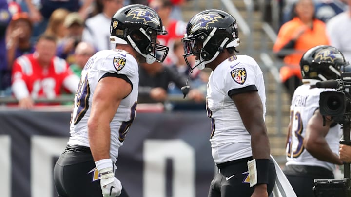 Sep 25, 2022; Foxborough, Massachusetts, USA; Baltimore Ravens quarterback Lamar Jackson (8) and Baltimore Ravens tight end Mark Andrews (89) celebrate after a touchdown during the first half against the New England Patriots at Gillette Stadium. Mandatory Credit: Paul Rutherford-Imagn Images