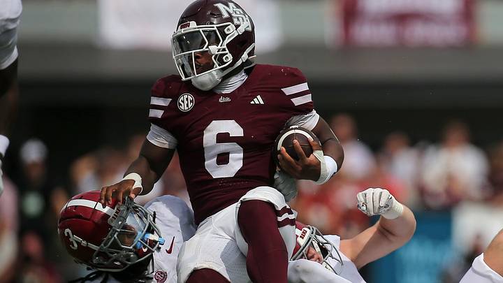 Mississippi State Bulldogs running back Kolin Wilson (6) runs the ball as Alabama Crimson Tide defensive back Keon Sabb (3) and linebacker Luke Metz (4) make the tackle during the second quarter at Davis Wade Stadium at Scott Field. Mississippi State Bulldogs running back Kolin Wilson (6) runs the ball as Alabama Crimson Tide defensive back Keon Sabb (3) and linebacker Luke Metz (4) make the tackle during the second quarter at Davis Wade Stadium at Scott Field.