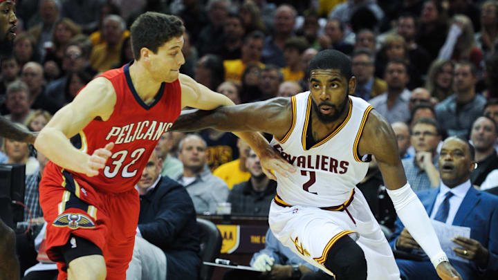 Nov 10, 2014; Cleveland, OH, USA; Cleveland Cavaliers guard Kyrie Irving (2) and New Orleans Pelicans guard Jimmer Fredette (32) at Quicken Loans Arena. Mandatory Credit: Ken Blaze-Imagn Images Nov 10, 2014; Cleveland, OH, USA; Cleveland Cavaliers guard Kyrie Irving (2) and New Orleans Pelicans guard Jimmer Fredette (32) at Quicken Loans Arena. Mandatory Credit: Ken Blaze-Imagn Images