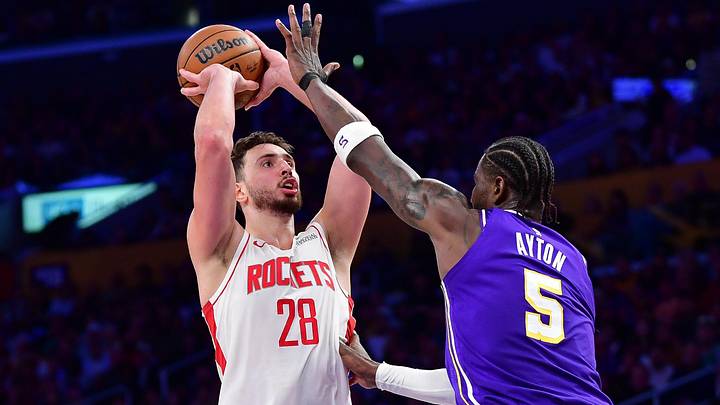 Apr 29, 2026; Los Angeles, California, USA; Houston Rockets center Alperen Sengun (28) shoots against Los Angeles Lakers center Deandre Ayton (5) during the second half in game five of the first round of the 2026 NBA Playoffs at Crypto.com Arena. Mandatory Credit: Gary A. Vasquez-Imagn Images