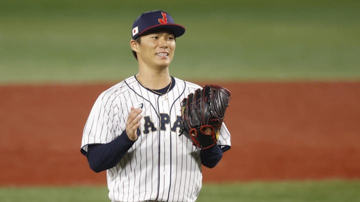 Aug 4, 2021; Yokohama, Japan; Team Japan pitcher Yoshinobu Yamamoto (17) reacts against Korea in a